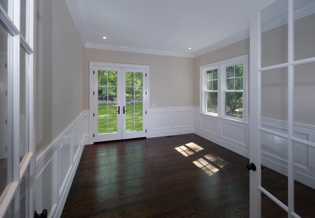 77 Autumn Road Weston, MA 02493 - Photo 17 of 24 a view of empty room with wooden floor and windows