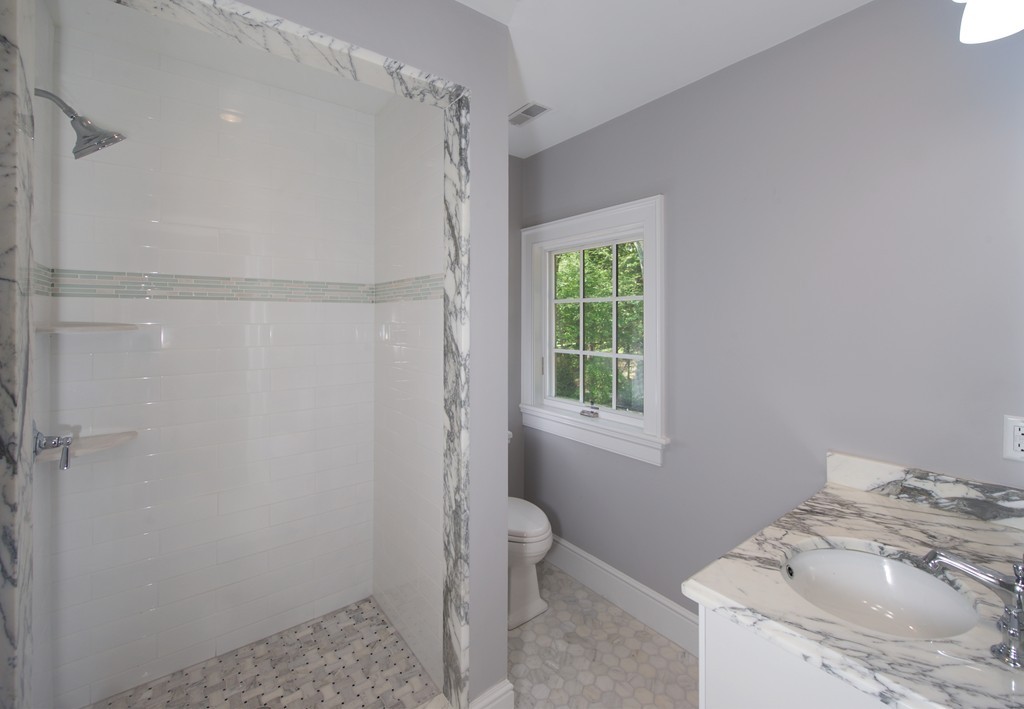 77 Autumn Road Weston, MA 02493 - Photo 21 of 24 a bathroom with a sink toilet and shower