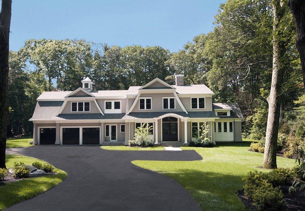 77 Autumn Road Weston, MA 02493 - Photo 24 of 24 a front view of a house with a garden