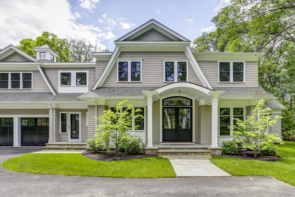 77 Autumn Road Weston, MA 02493 - Photo 4 of 24 a view of a house with a yard and potted plants