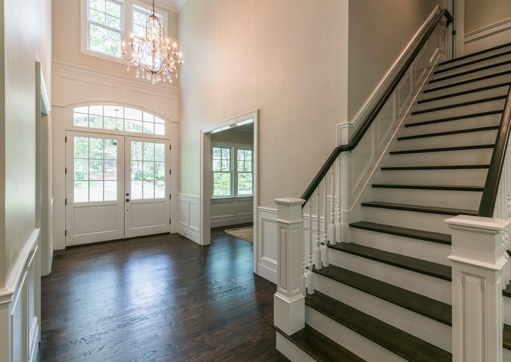 77 Autumn Road Weston, MA 02493 - Photo 6 of 24 a view of an entryway with wooden floor and stairs