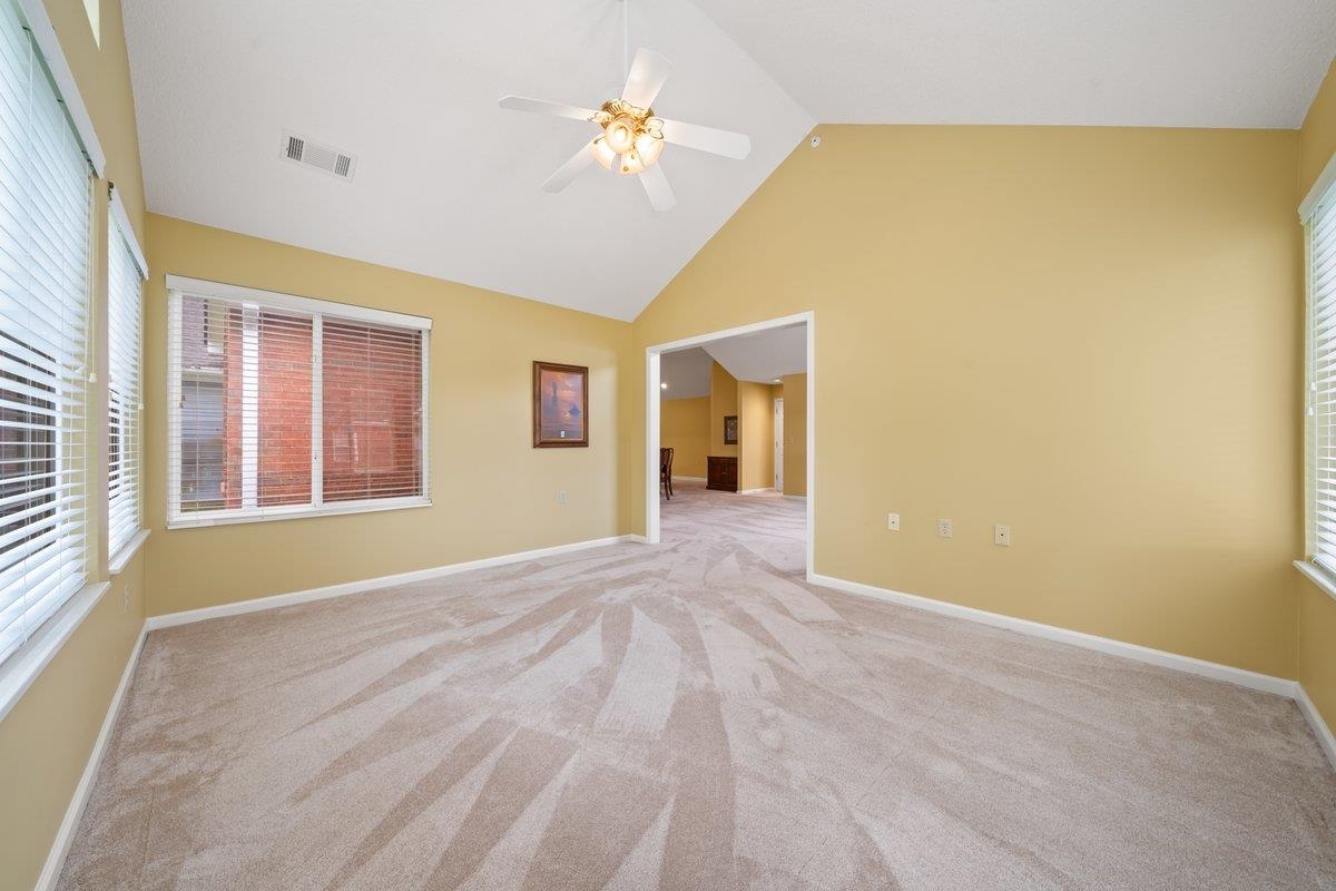 1102 Oak Heights Lane, Unit 93 Collierville, TN 38017 - Photo 11 of 30 a view of an empty room with a window