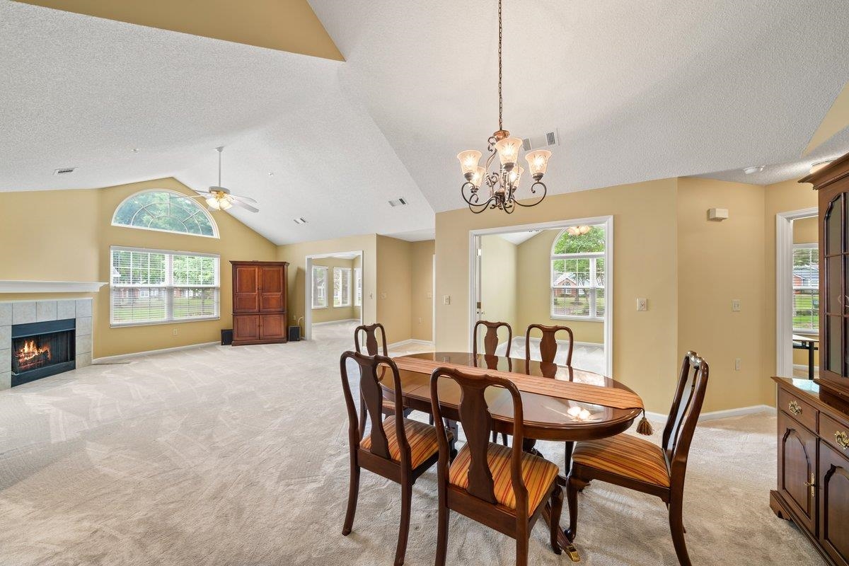 1102 Oak Heights Lane, Unit 93 Collierville, TN 38017 - Photo 14 of 30 a view of a dining room with furniture window and outside view