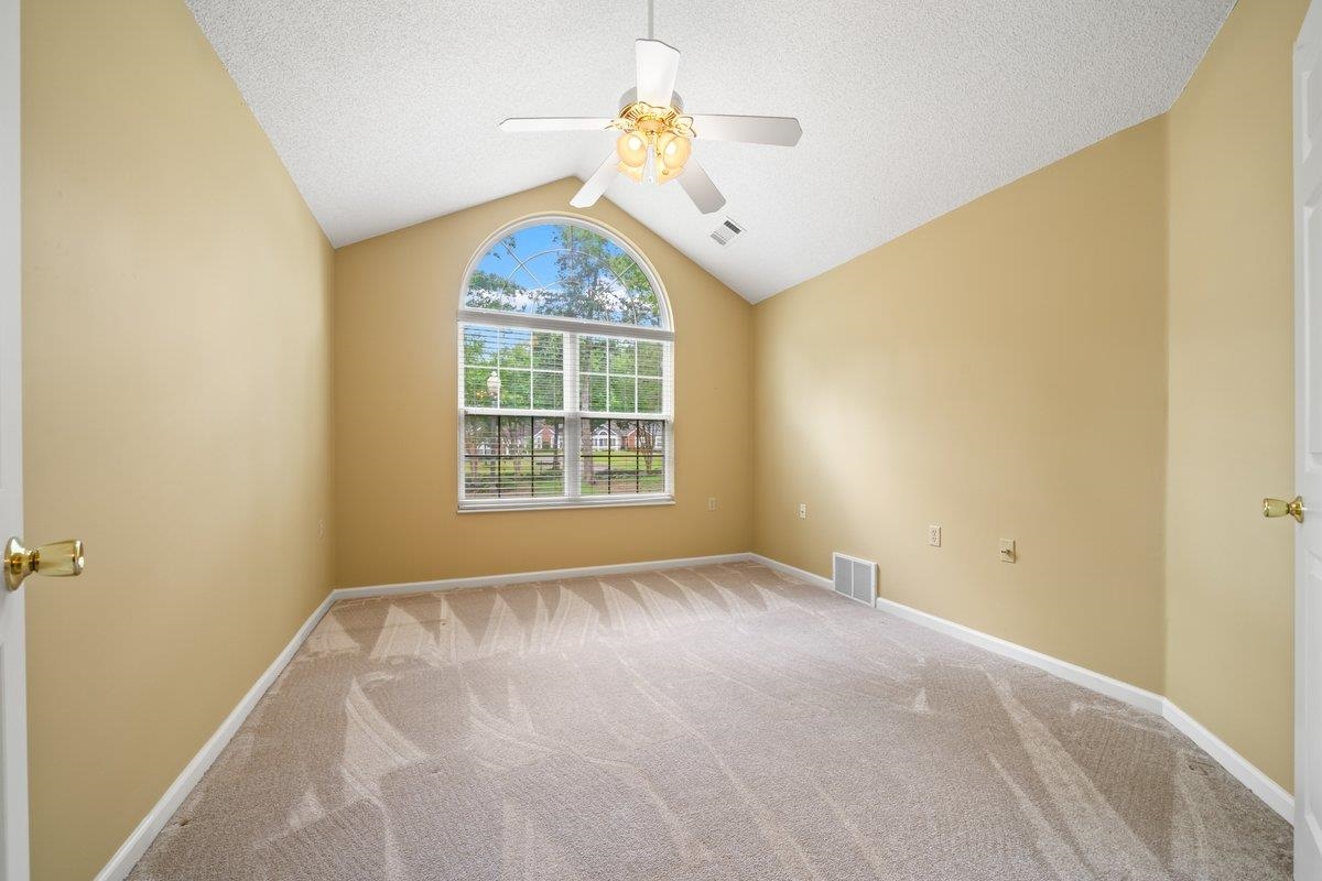 1102 Oak Heights Lane, Unit 93 Collierville, TN 38017 - Photo 23 of 30 an empty room with windows