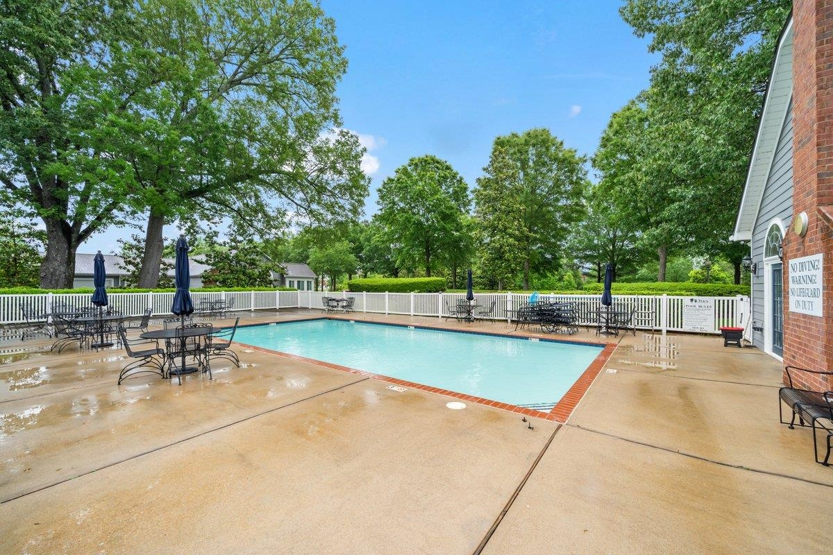 1102 Oak Heights Lane, Unit 93 Collierville, TN 38017 - Photo 29 of 30 a view of a patio with swimming pool