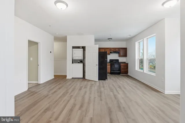 a big room with closet and windows