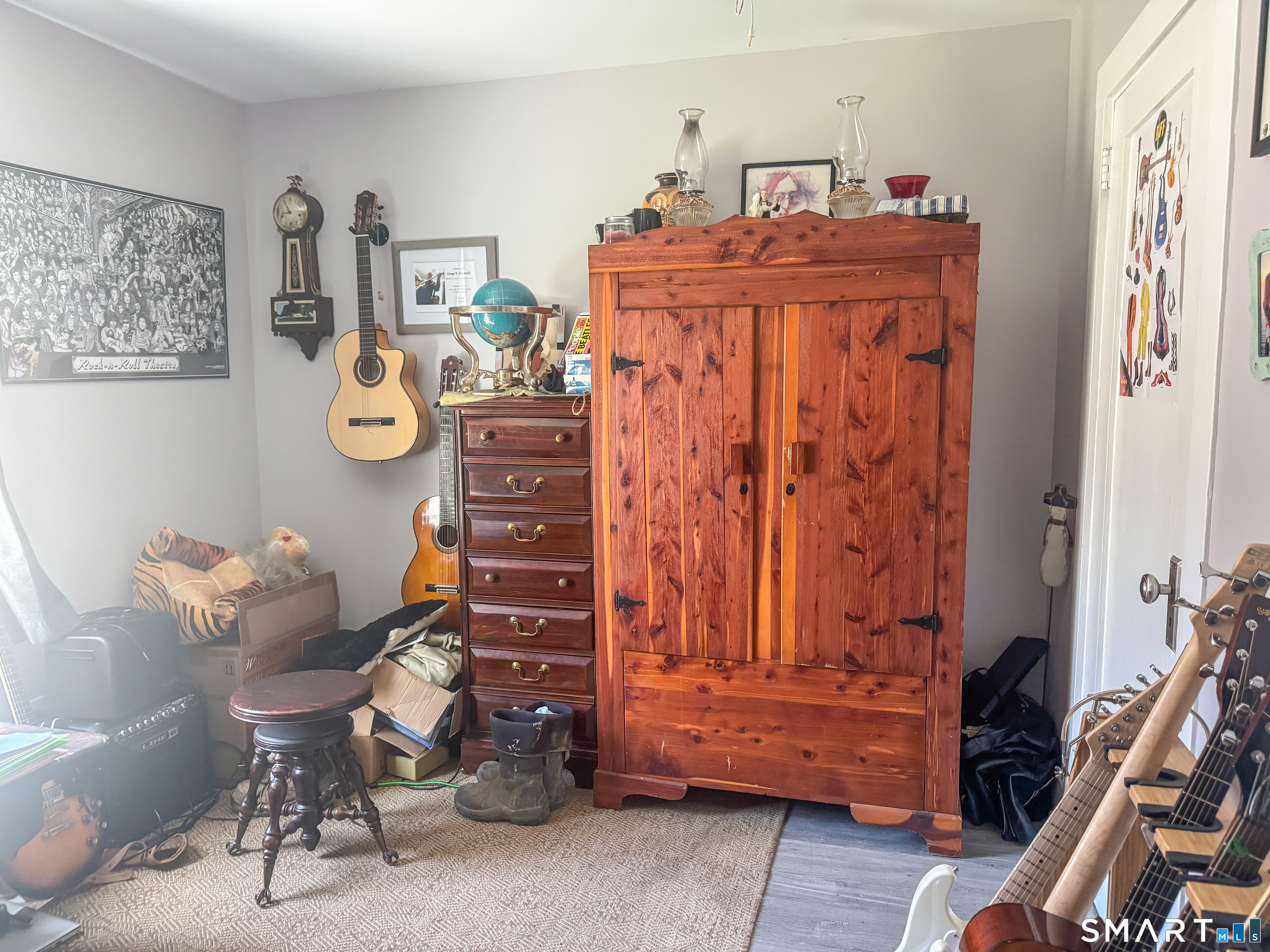 36 Jennings Street Norwich, CT 06360 - Photo 20 of 33 a living room with furniture and a closet