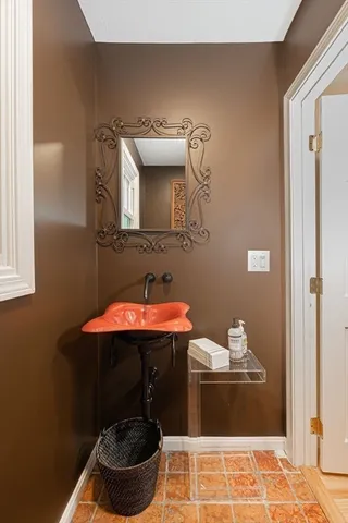 a view of a livingroom with workspace and a window