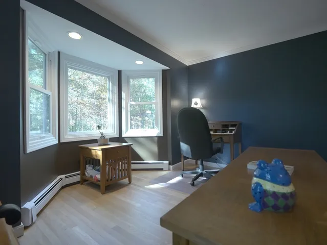 a view of a kitchen with an empty space and a window