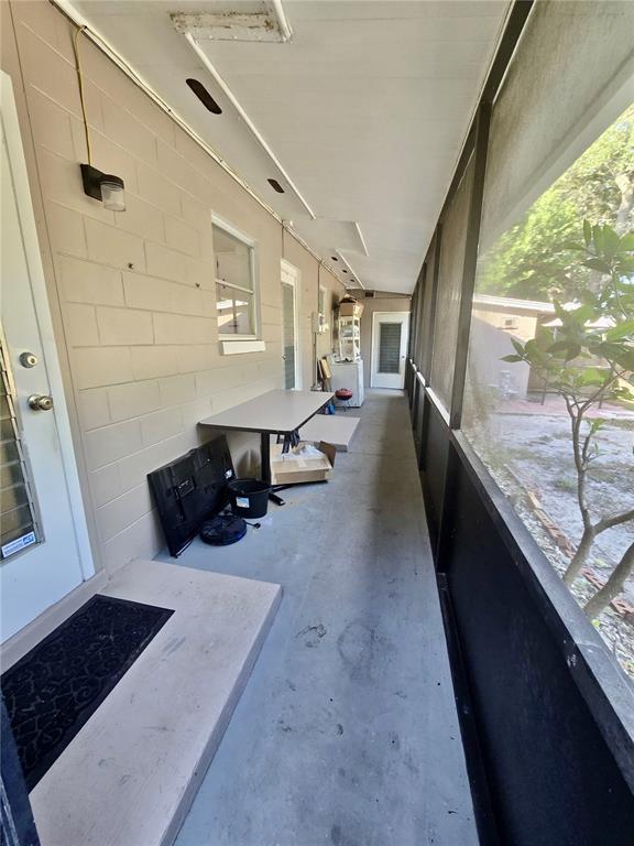 589 Swallow Lane Spring Hill, FL 34606 - Photo 12 of 14 a large white room with a large window