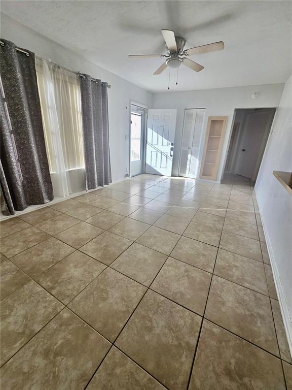 589 Swallow Lane Spring Hill, FL 34606 - Photo 3 of 14 a view of an empty room with a window