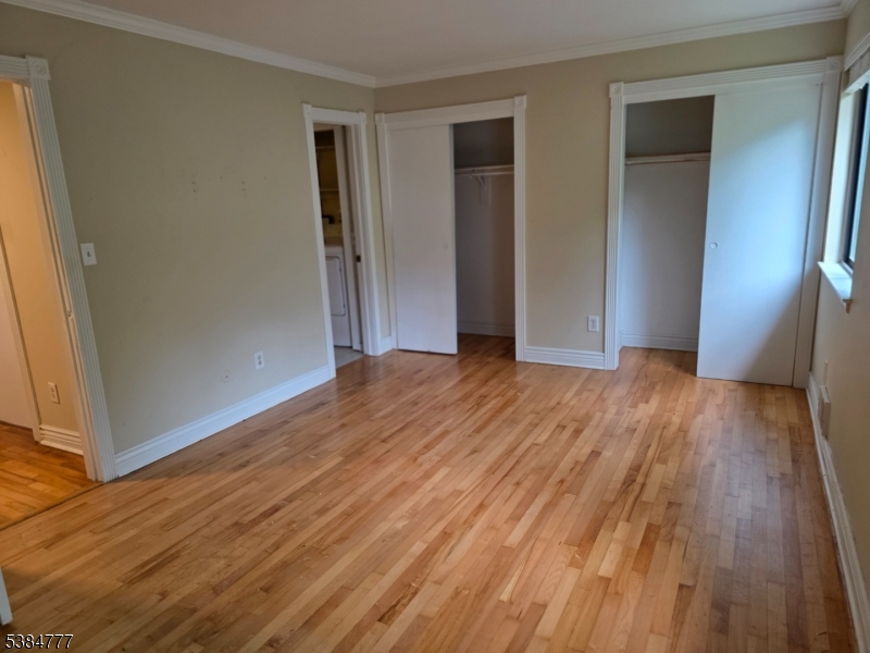 3 Chestnut Court High Bridge, NJ 08829 - Photo 14 of 31 a view of an empty room with wooden floor and a window