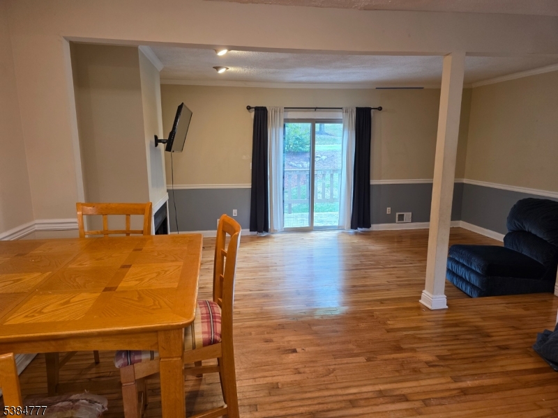 3 Chestnut Court High Bridge, NJ 08829 - Photo 5 of 31 a view of a dining room with furniture and wooden floor