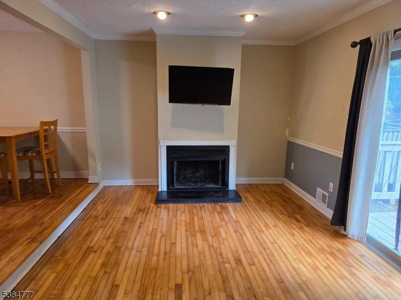3 Chestnut Court High Bridge, NJ 08829 - Photo 6 of 31 a view of a livingroom with wooden floor and a fireplace