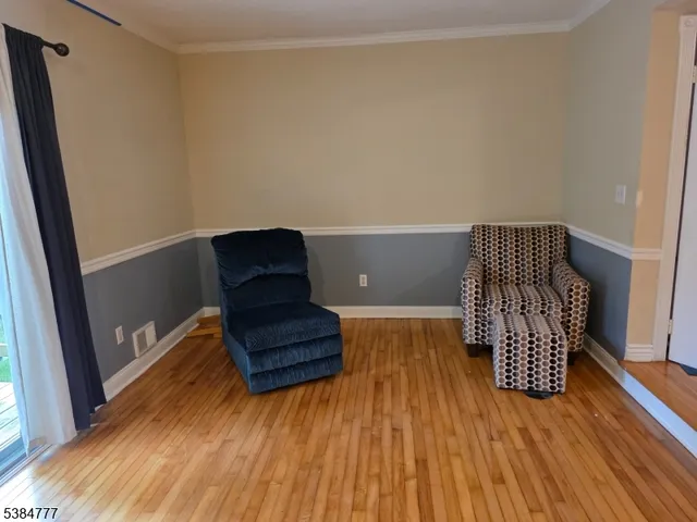 a view of workspace with wooden floor