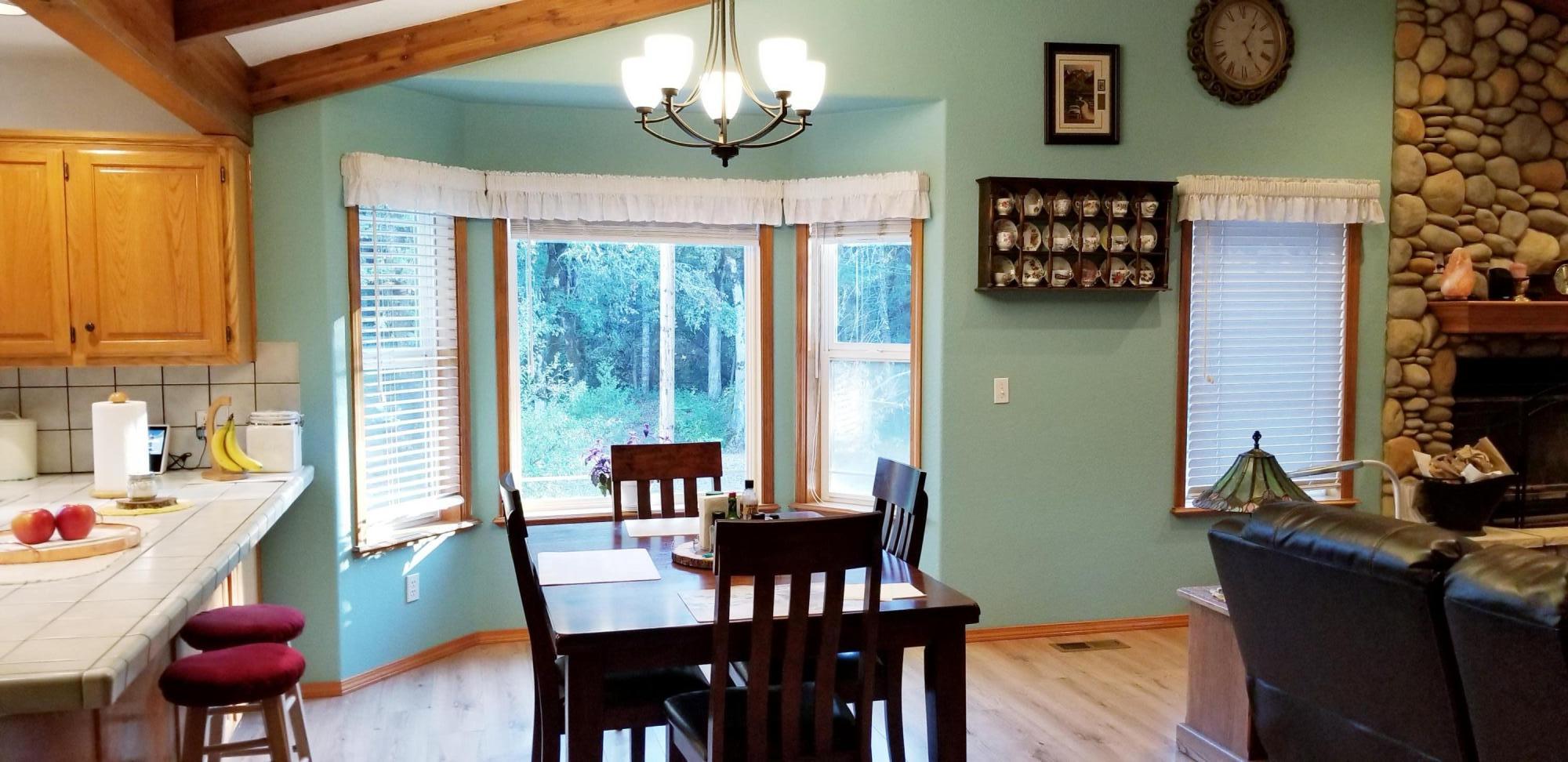 975 Waldo Road O'Brien, OR 97534 - Photo 8 of 27 NICE WINDOWS FOR NATURAL LIGHT WHILE ENJOYING YOUR MEALS