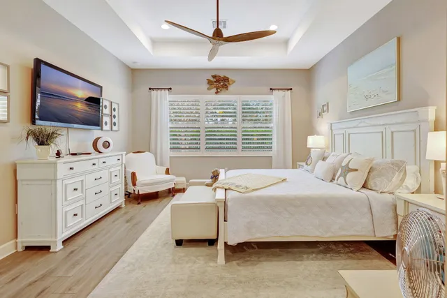 an aerial view of a house with garden space and street view