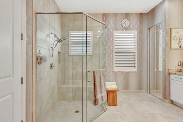 a view of multiple houses with a street