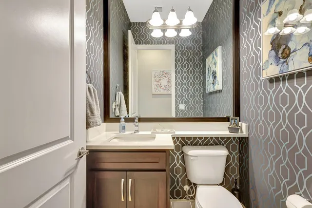 a view of a room with lots of counter space and a wooden floor