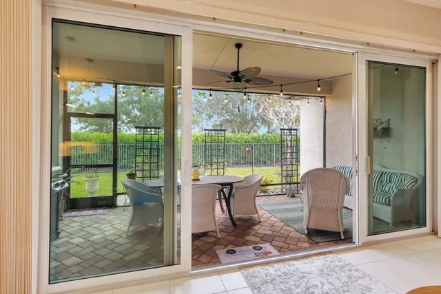 a view of a swimming pool with a yard