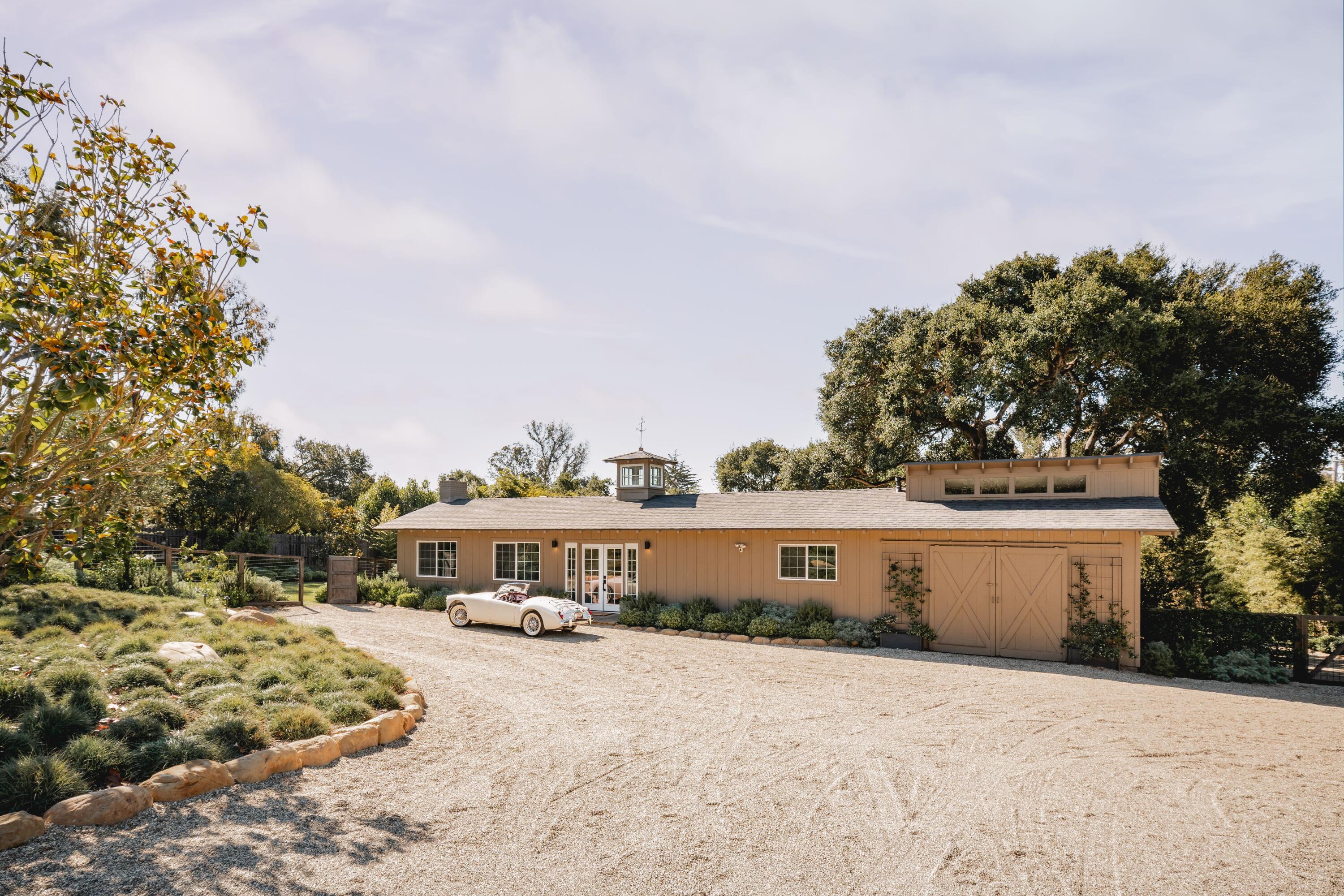 2775 Sycamore Canyon Road Montecito, CA 93108 - Photo 17 of 33 a front view of a house with a yard