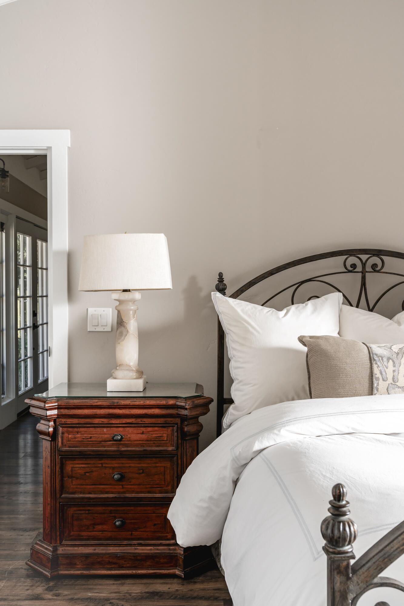 2775 Sycamore Canyon Road Montecito, CA 93108 - Photo 22 of 33 a bedroom with a bed and wooden floor