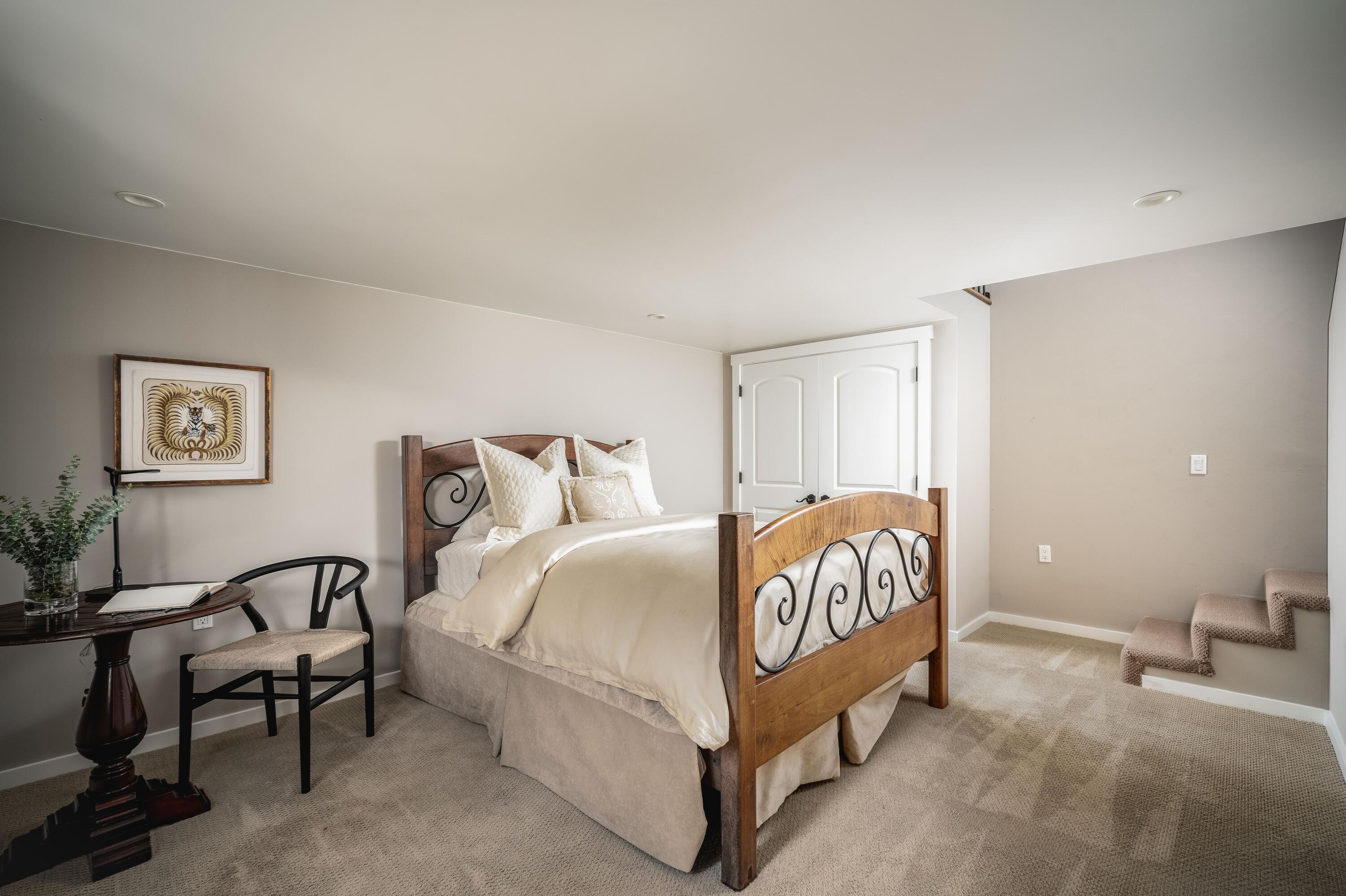 2775 Sycamore Canyon Road Montecito, CA 93108 - Photo 24 of 33 a spacious bedroom with a bed and a couch