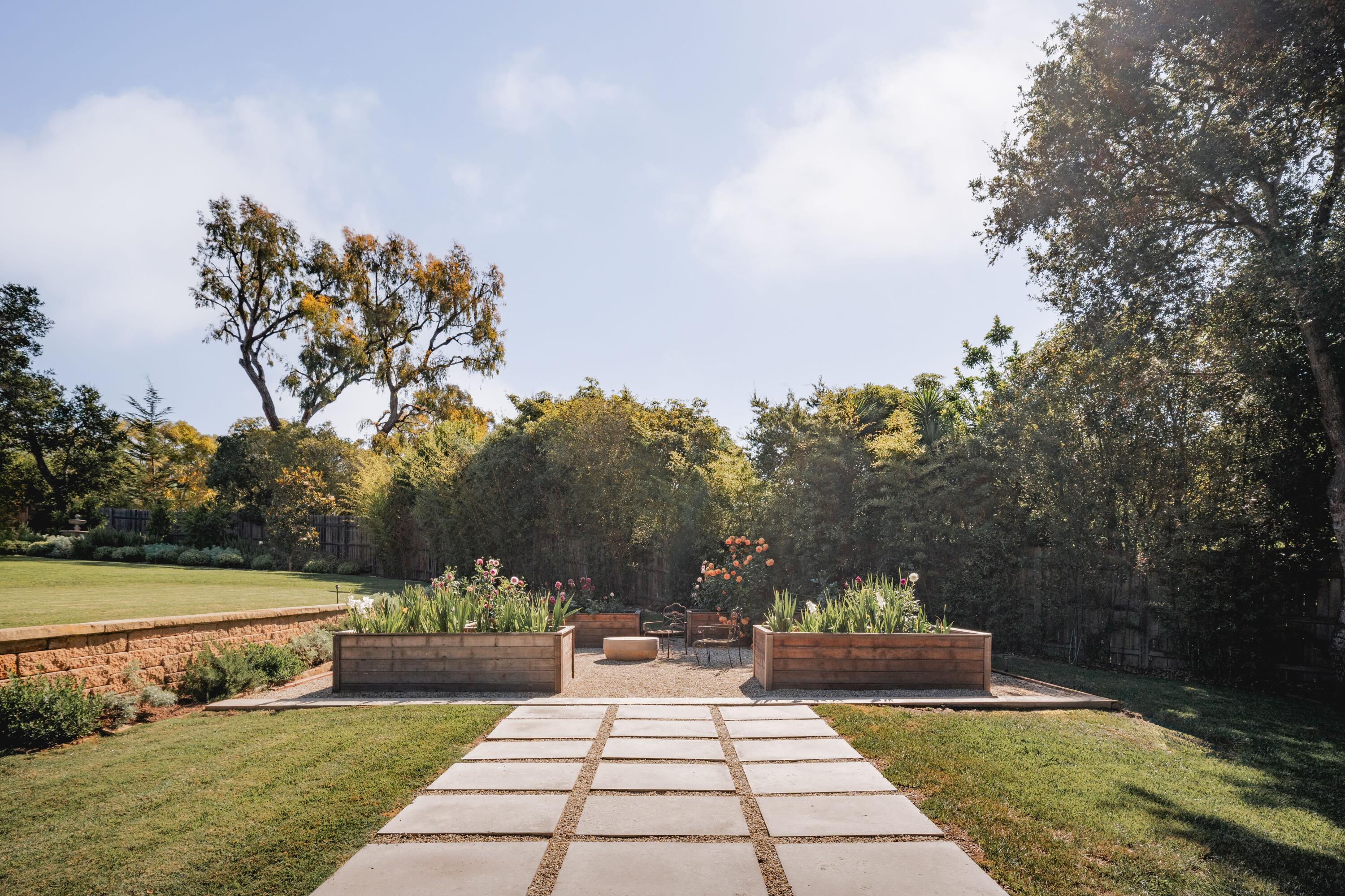 2775 Sycamore Canyon Road Montecito, CA 93108 - Photo 28 of 33 a view of a yard with a fountain and a pathway