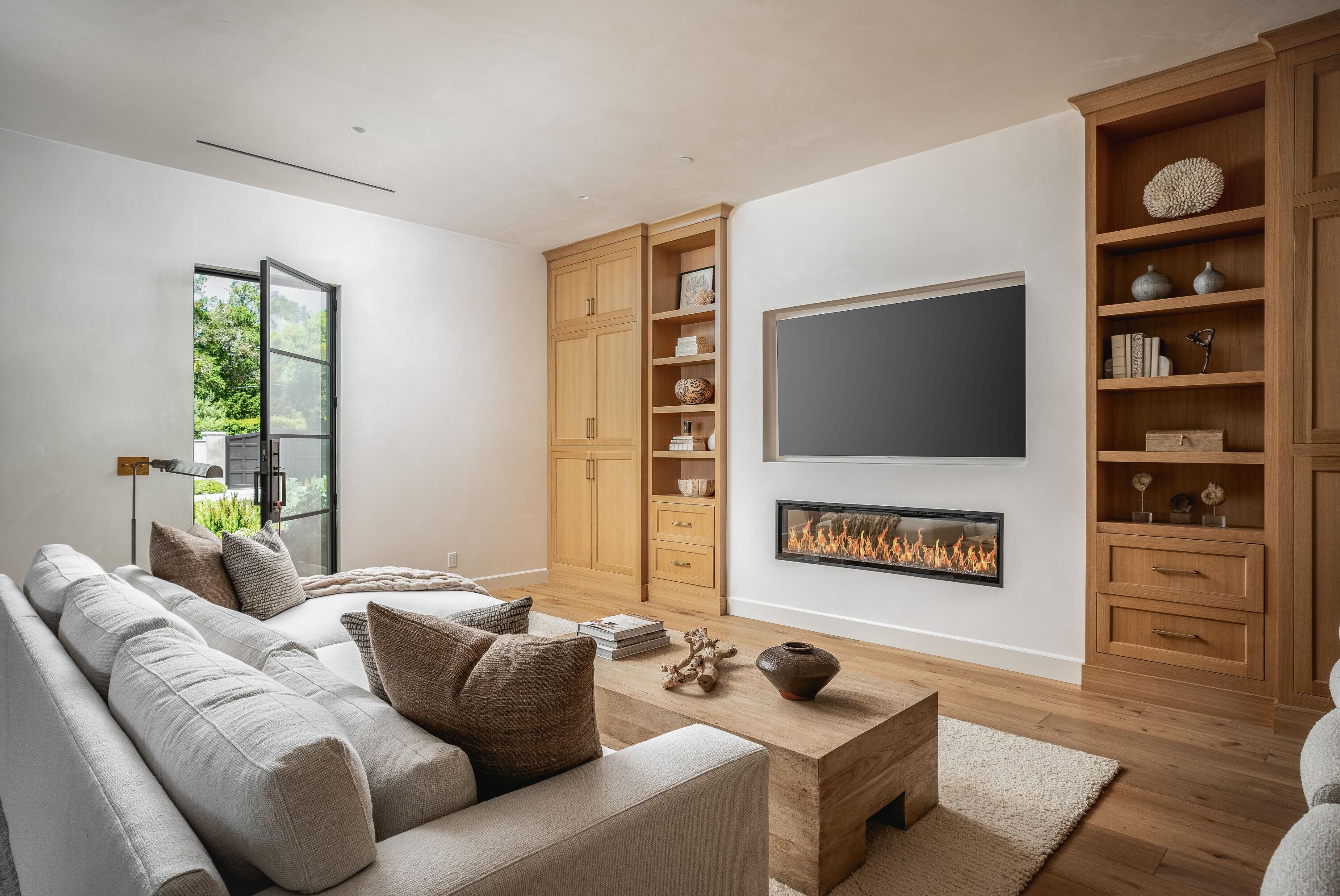 2775 Sycamore Canyon Road Montecito, CA 93108 - Photo 7 of 33 a living room with furniture and a flat screen tv