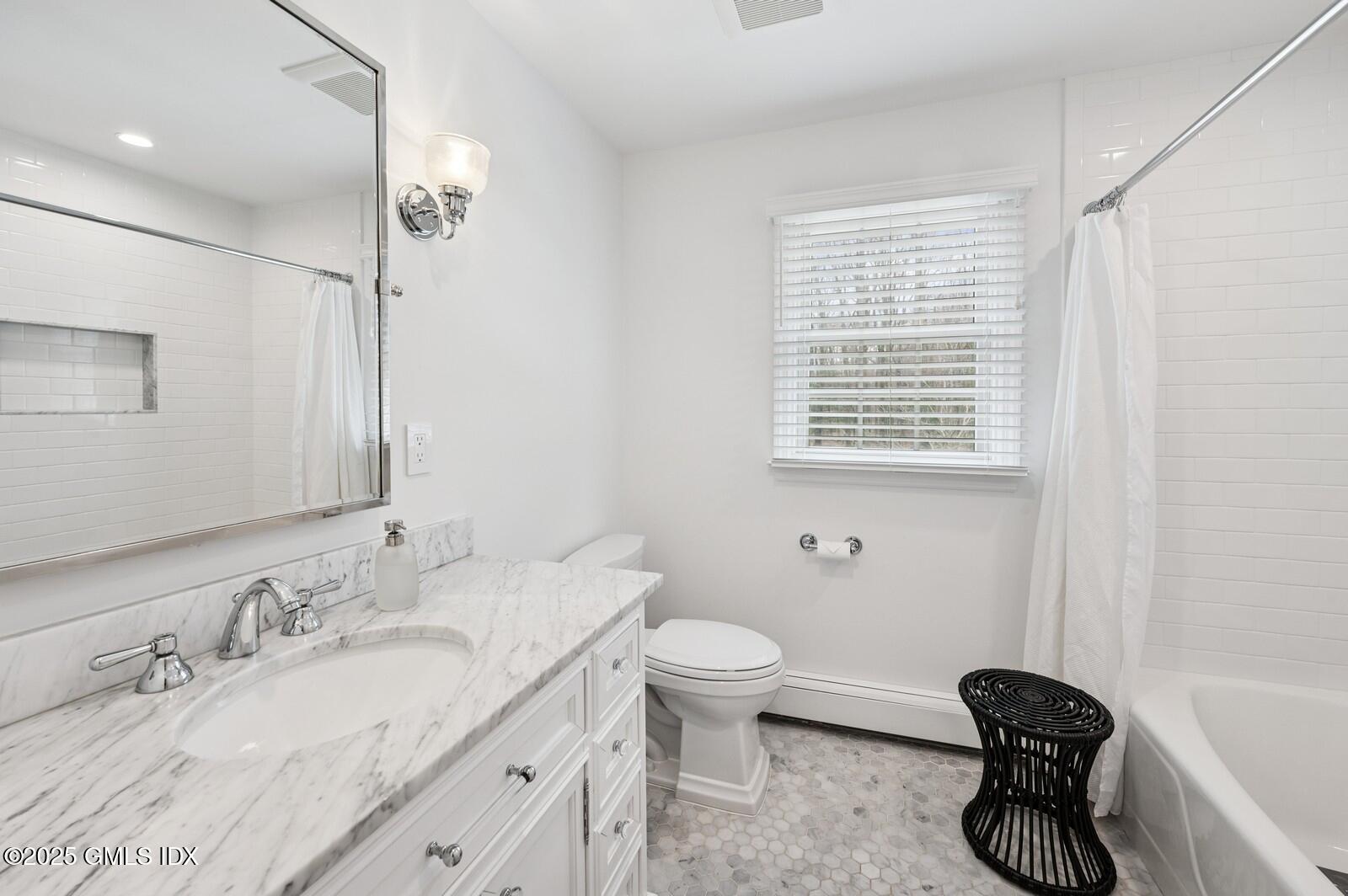 6 Pilgrim Road Darien, CT 06820 - Photo 17 of 23 a bathroom with a granite countertop sink toilet and shower