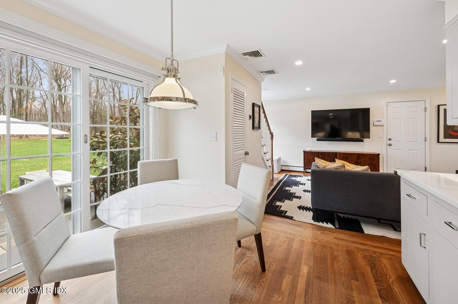 6 Pilgrim Road Darien, CT 06820 - Photo 10 of 23 a living room with furniture and a flat screen tv
