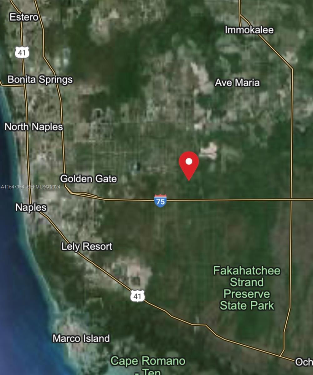 4160 26th Naples, FL 34117 - Photo 4 of 4 a view of swimming pool from a bathroom