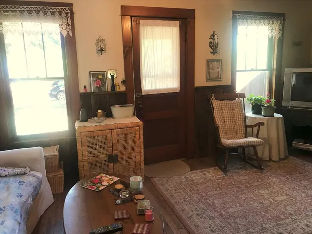 a room with furniture and a window