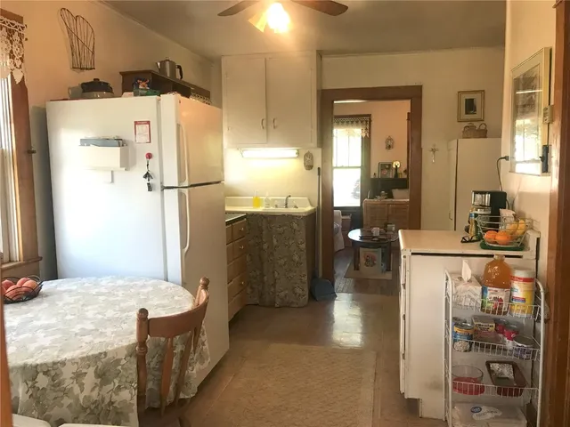 a bathroom with a tub and a shower