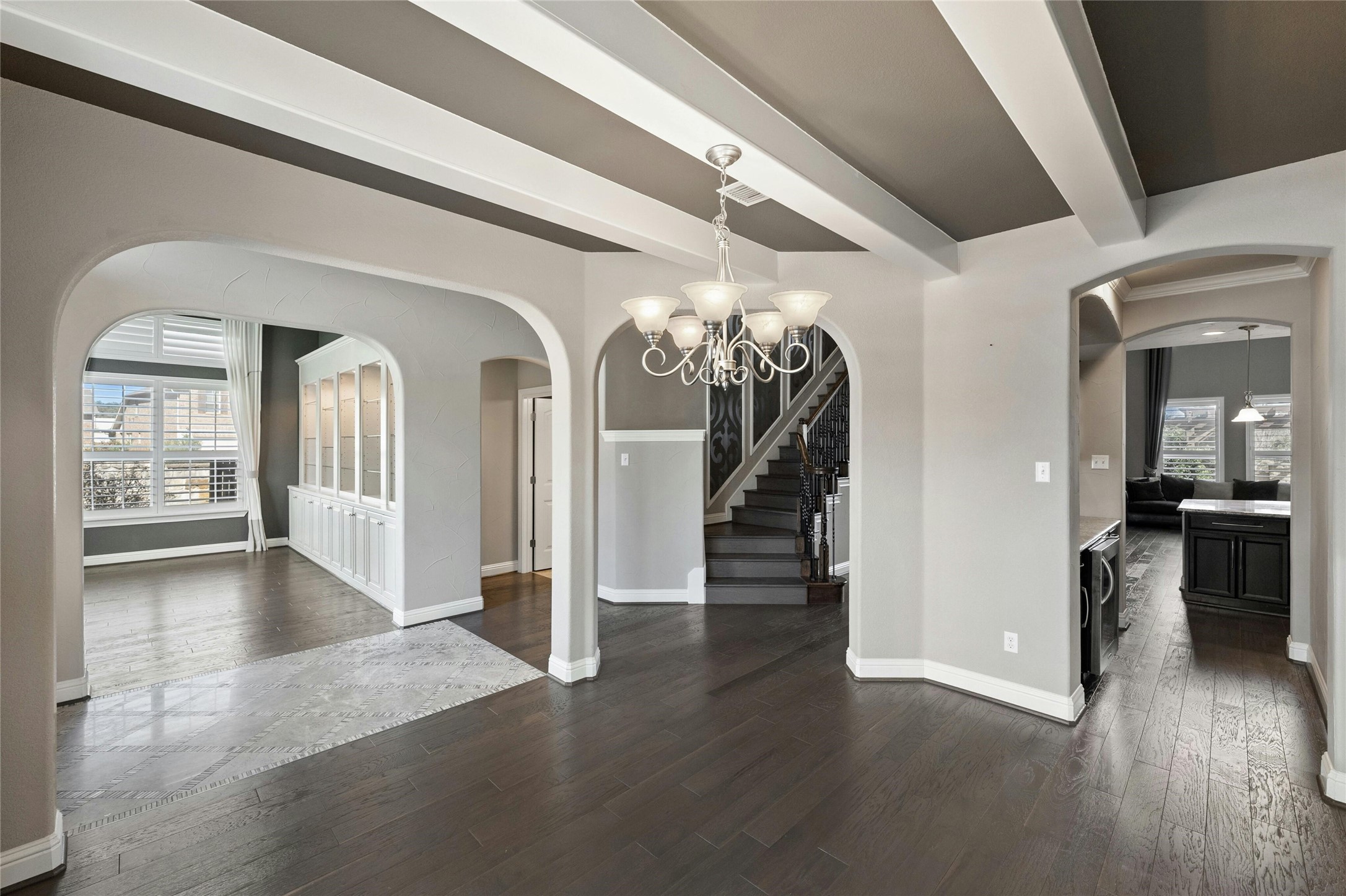 8501 High Summit Lane Austin, TX 78737 - Photo 12 of 38 a view of livingroom with hardwood floor and kitchen view