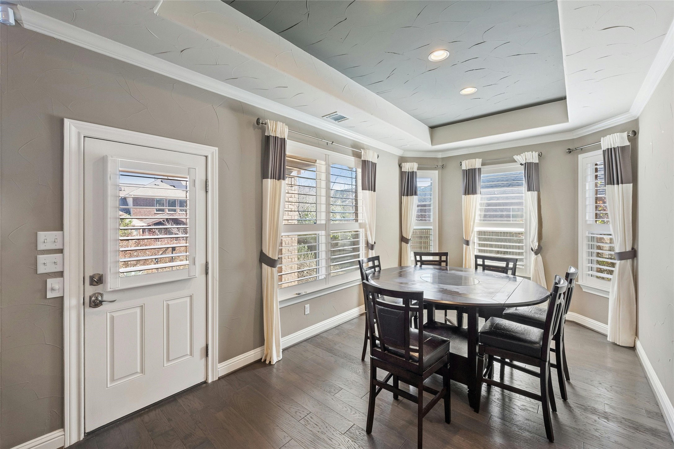 8501 High Summit Lane Austin, TX 78737 - Photo 14 of 38 a view of a dining room with furniture window and wooden floor