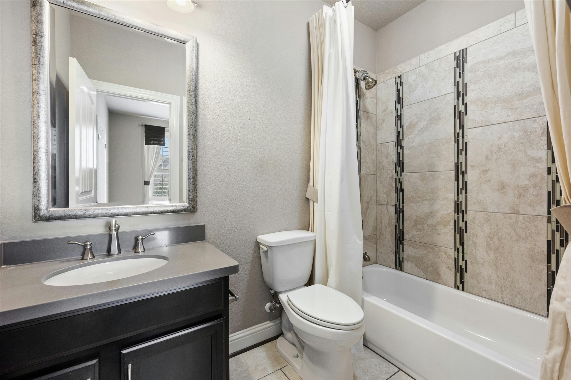 8501 High Summit Lane Austin, TX 78737 - Photo 26 of 38 a bathroom with a granite countertop sink toilet and shower