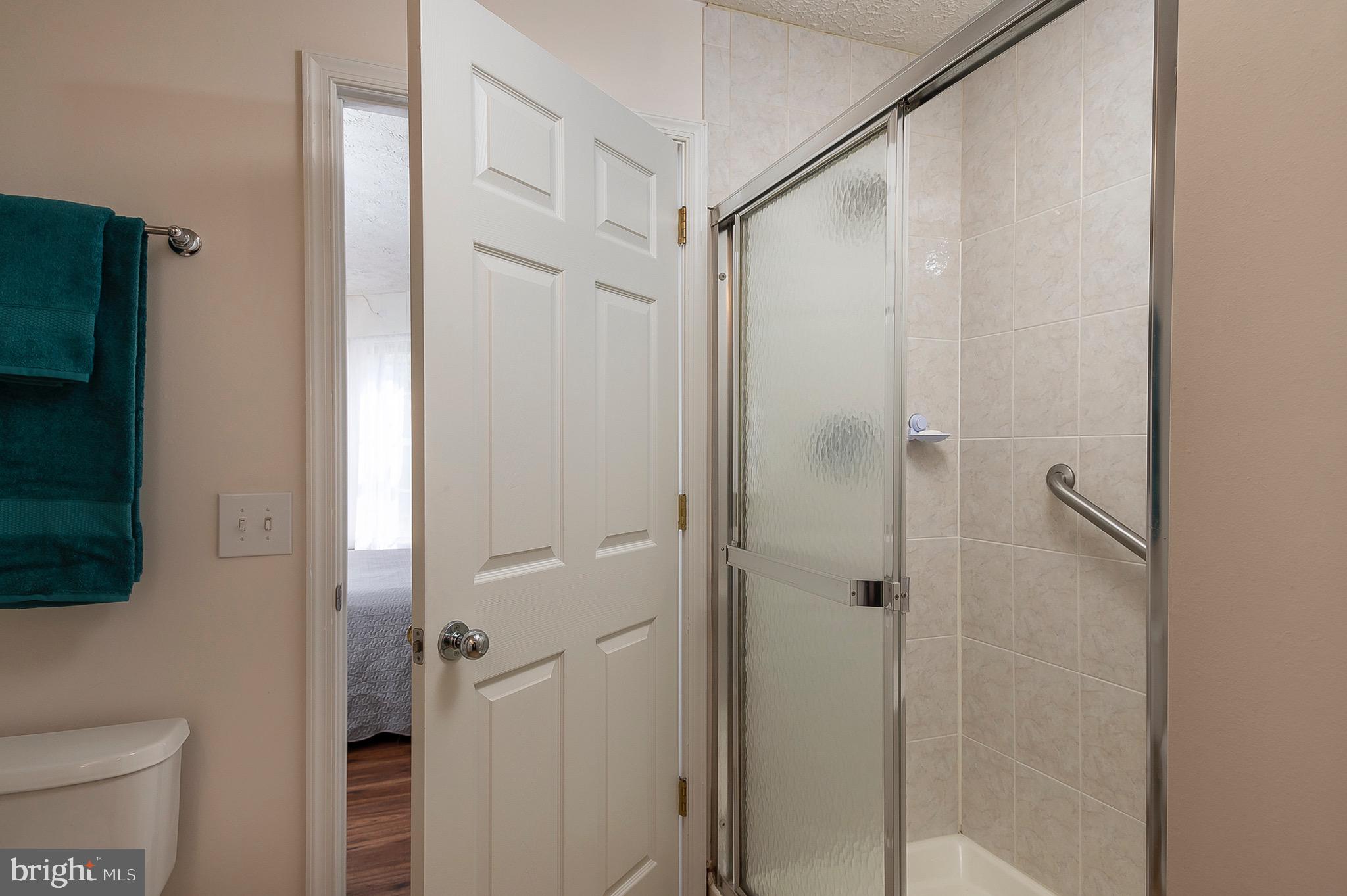 562 Kennington Road Reisterstown, MD 21136 - Photo 18 of 30 Owner's shower with ceramic tile and built-in seat