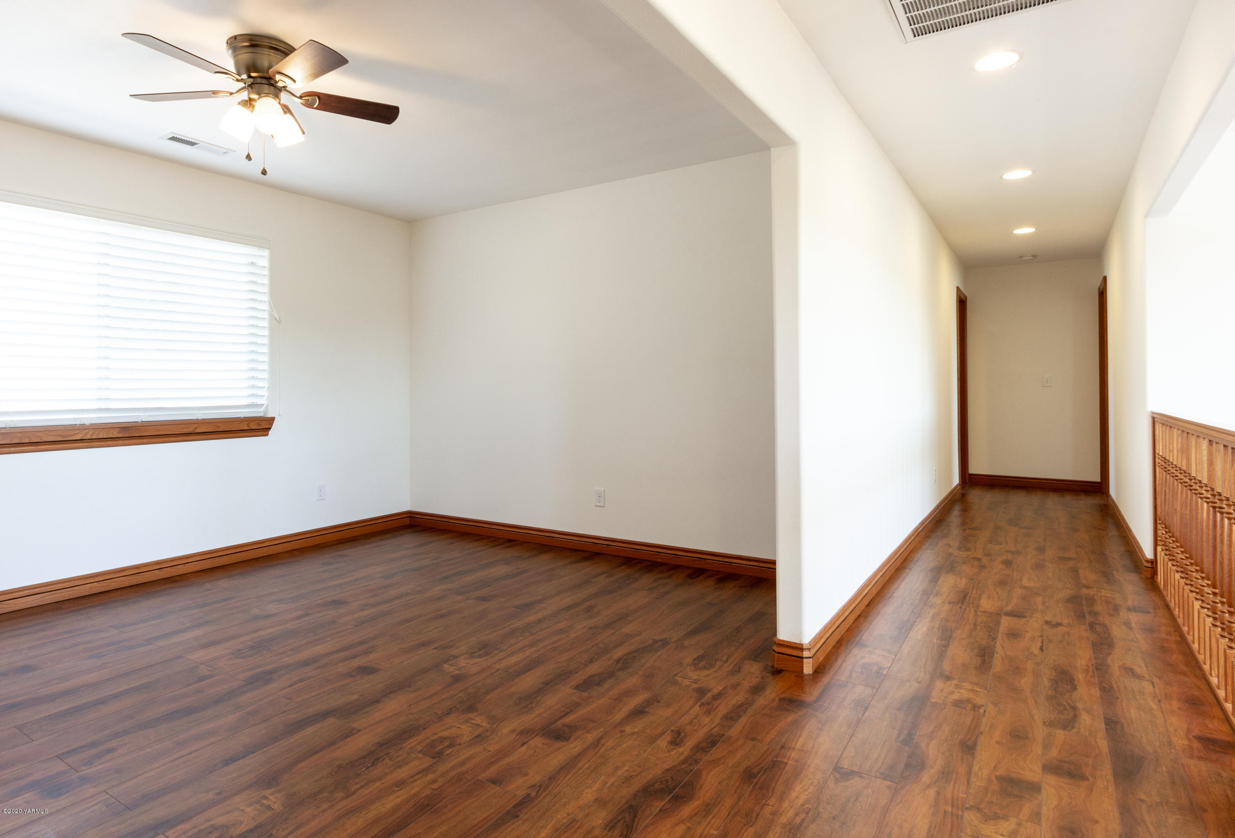 13351 Wide Hollow Road Yakima, WA 98908 - Photo 18 of 31 a view of an empty room with wooden floor