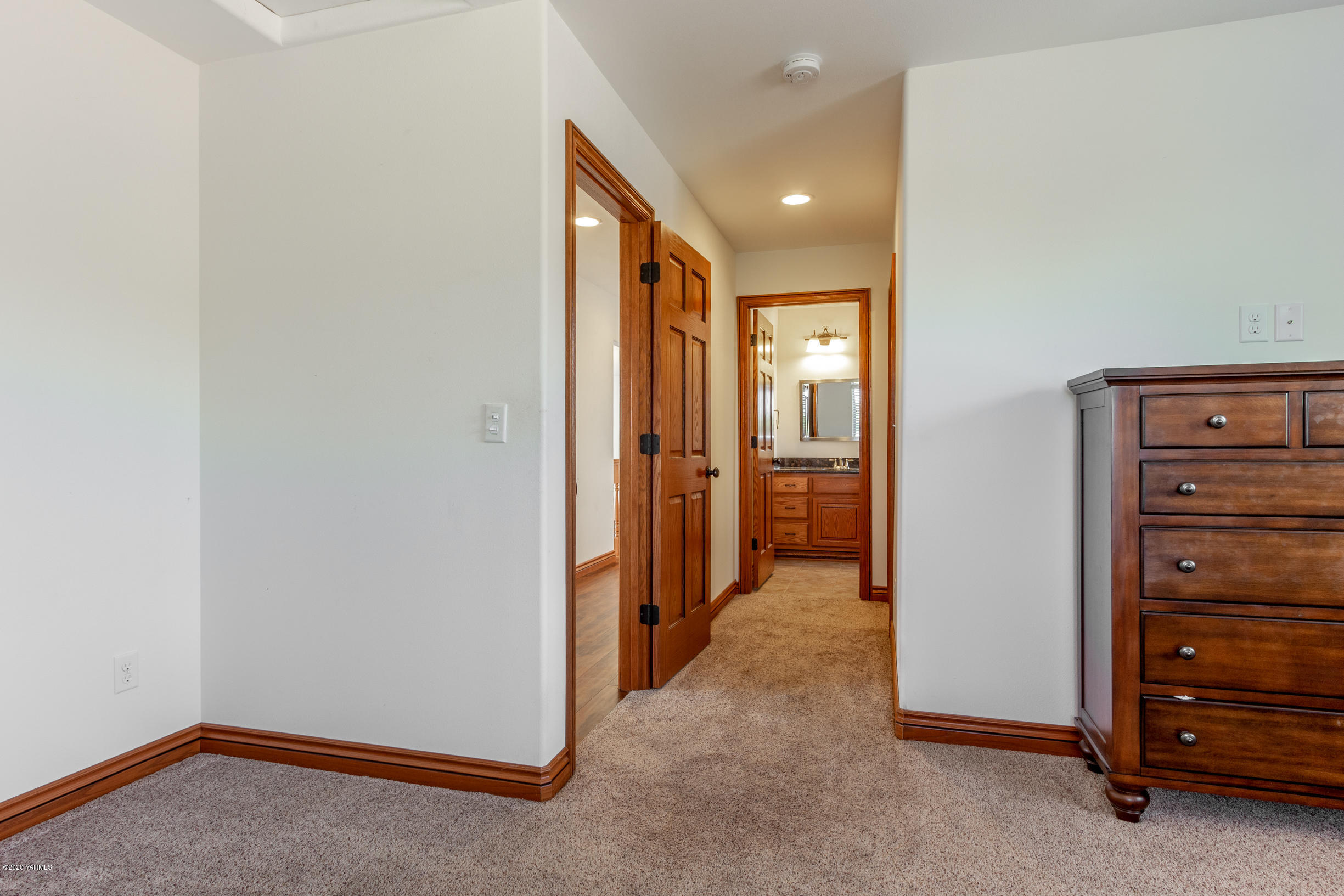 13351 Wide Hollow Road Yakima, WA 98908 - Photo 21 of 31 a view of hallway with closet and cabinet