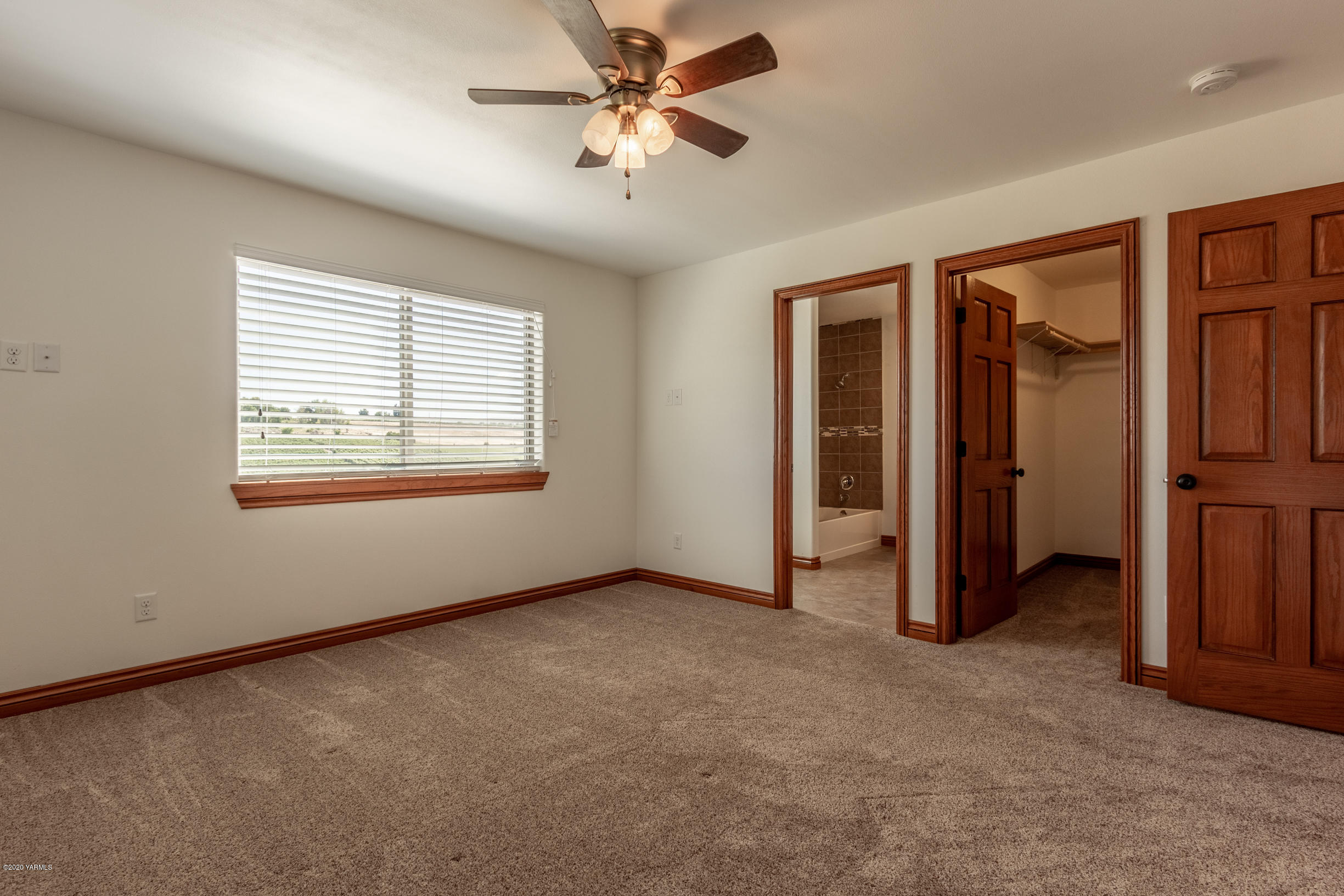 13351 Wide Hollow Road Yakima, WA 98908 - Photo 22 of 31 wooden floor in an empty room with a window