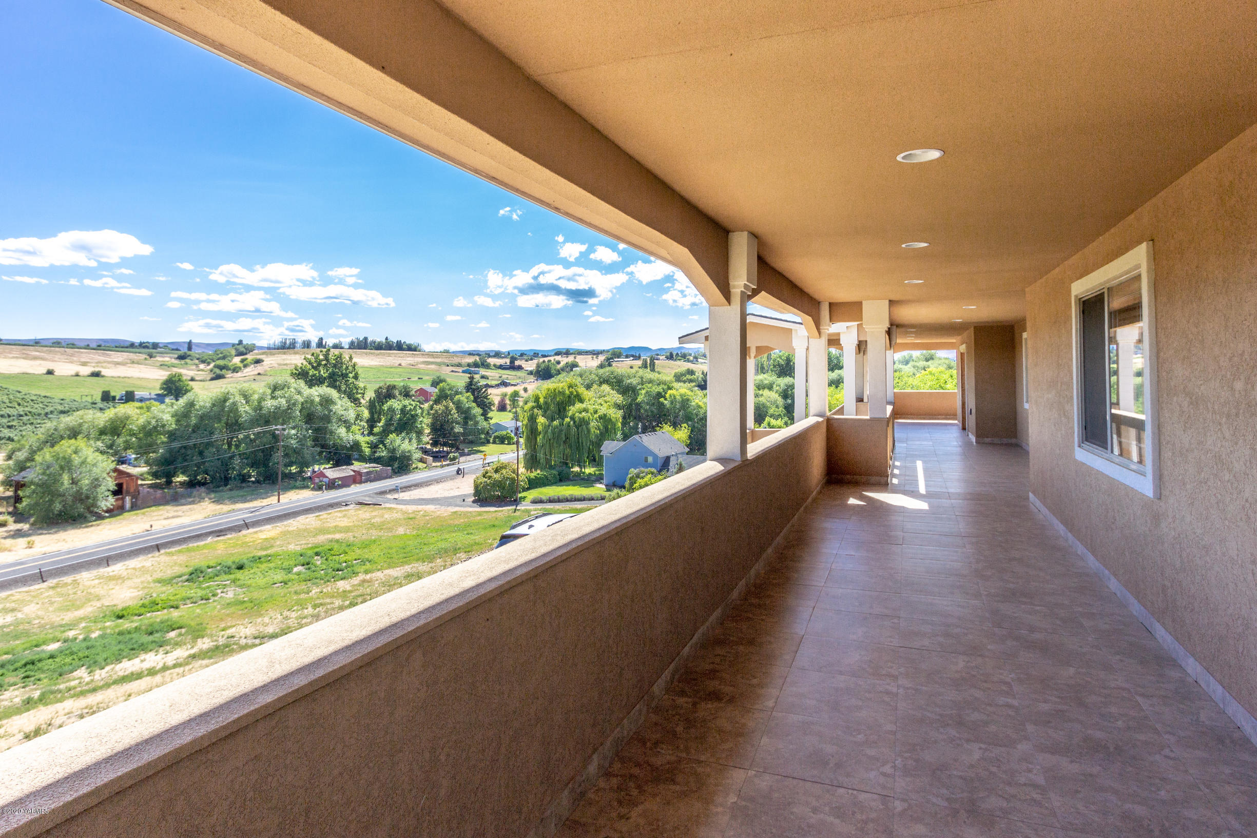 13351 Wide Hollow Road Yakima, WA 98908 - Photo 31 of 31 a view of a building from a balcony