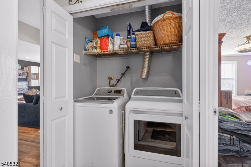 400 Daisy Court Jackson, NJ 08527 - Photo 22 of 29 a utility room with dryer and washer