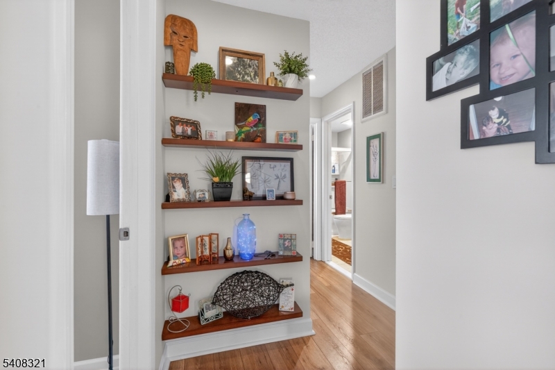 400 Daisy Court Jackson, NJ 08527 - Photo 23 of 29 a bedroom with furniture and a book shelf