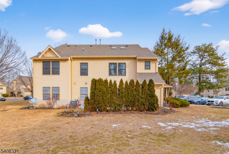 400 Daisy Court Jackson, NJ 08527 - Photo 29 of 29 a front view of a house with a yard