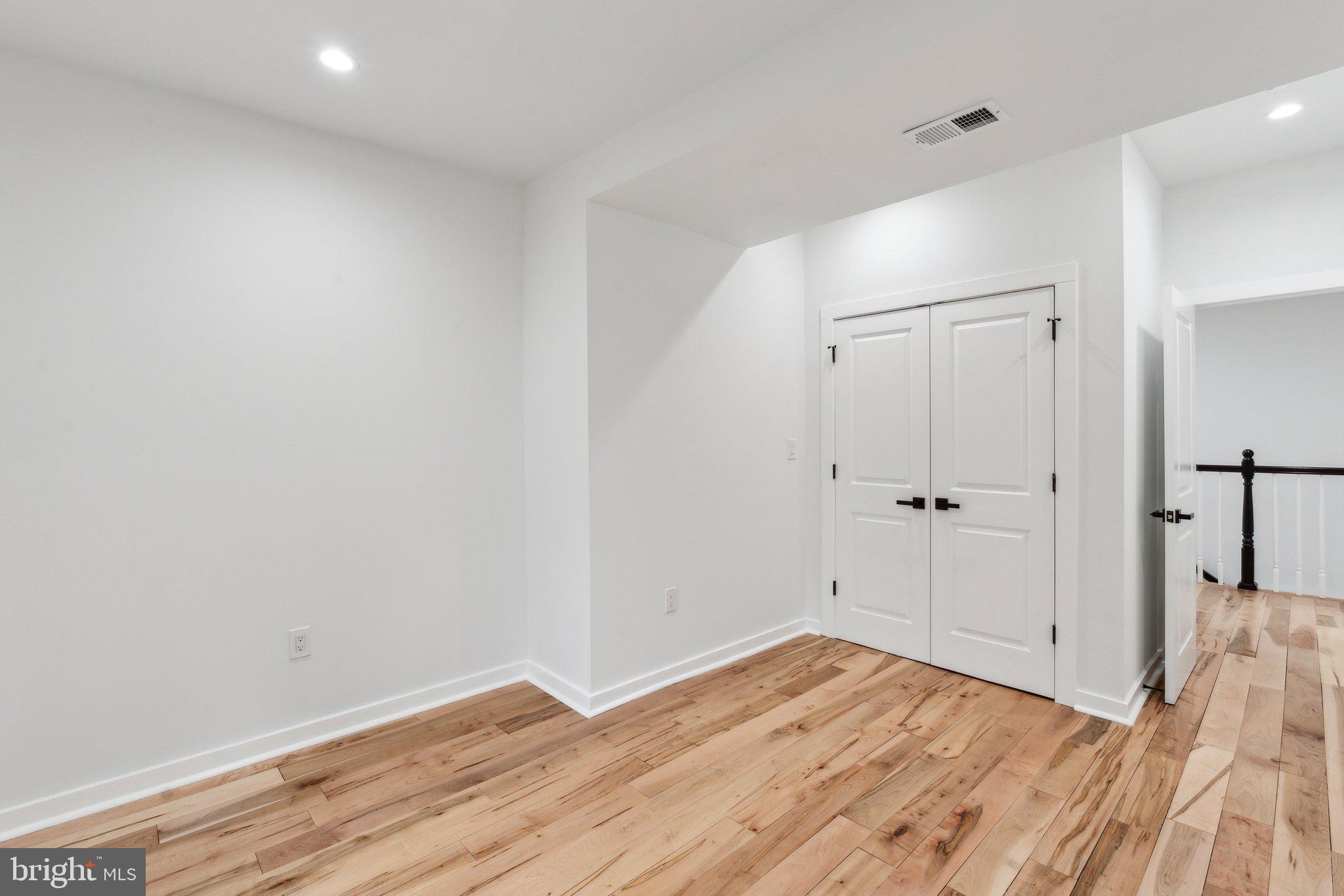 660 Columbia Road Northwest Washington, DC 20001 - Photo 15 of 44 a view of room with wooden floor