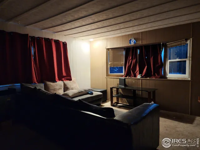 a room with furniture and a closet