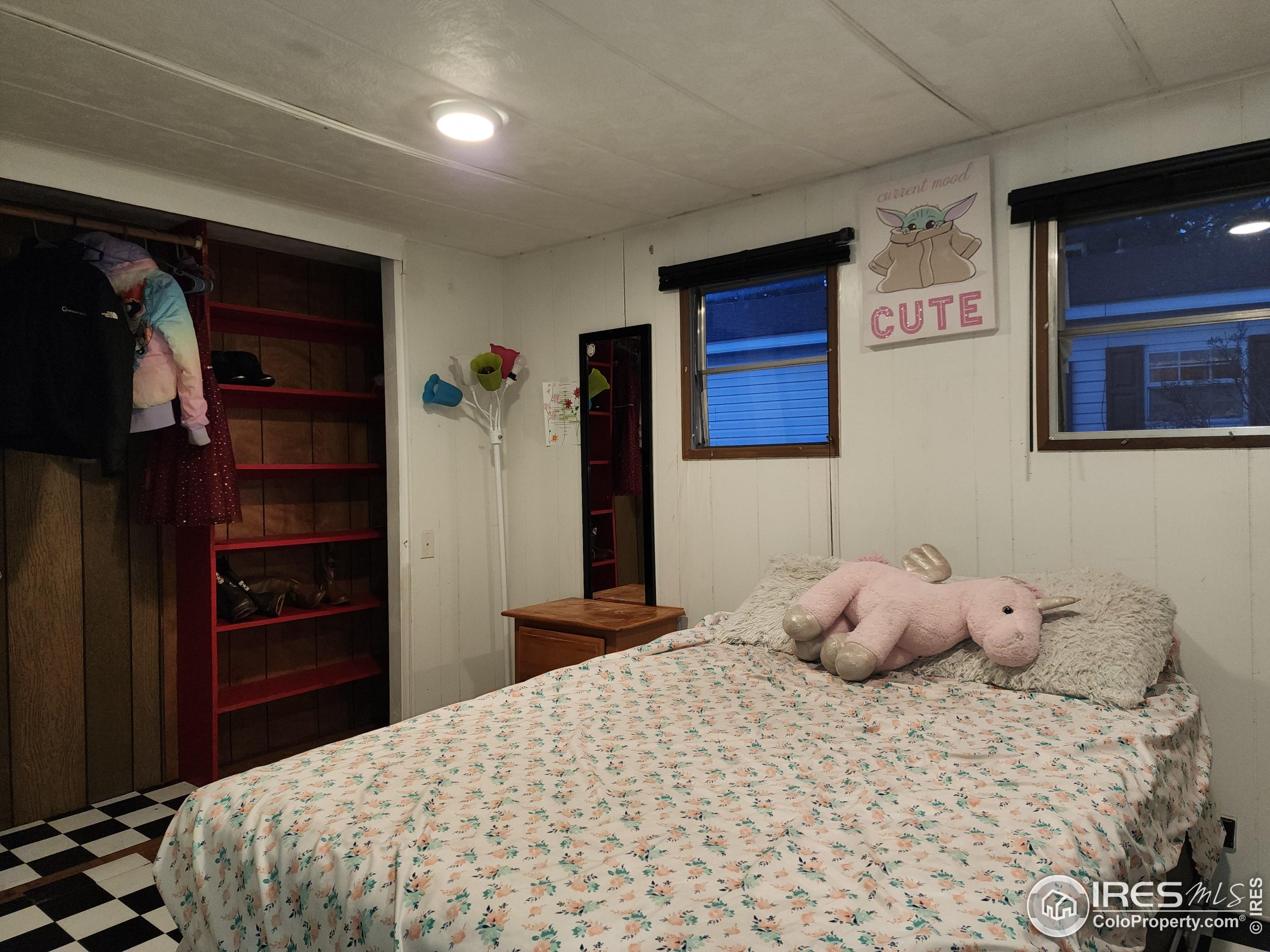 4500 19th Street, Unit 111 Boulder, CO 80304 - Photo 10 of 17 a bedroom with a bed and a closet