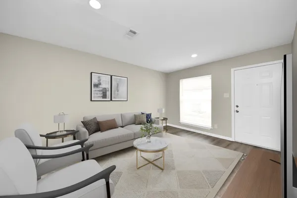 a kitchen with a sink a stove and cabinets