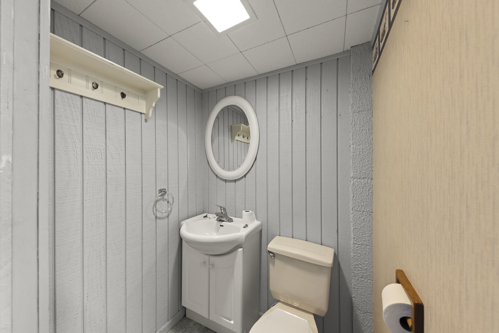 1204 Oneida Street Joliet, IL 60435 - Photo 20 of 30 a bathroom with a sink mirror and toilet